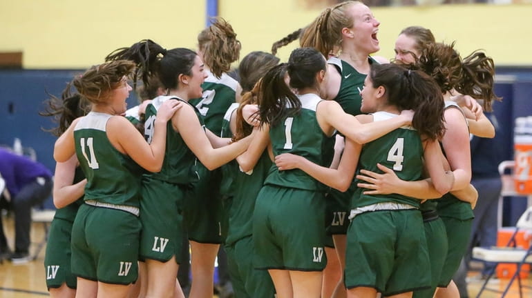 Locust Valley players celebrate their win during the Long Island Class...