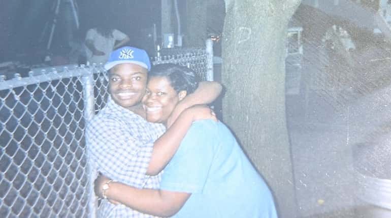 An undated photo of Dainell Simmons with his mother Glynice...