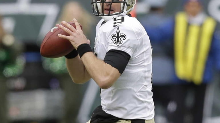 New Orleans Saints quarterback Drew Brees looks to pass during...