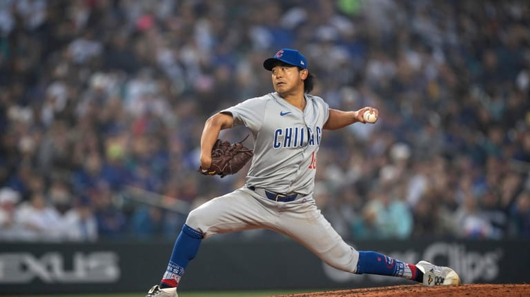 Chicago Cubs starter Shota Imanaga delivers a pitch during the...