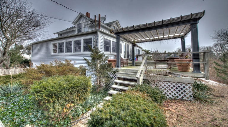 This Oak Beach home is listed for $649,717.
