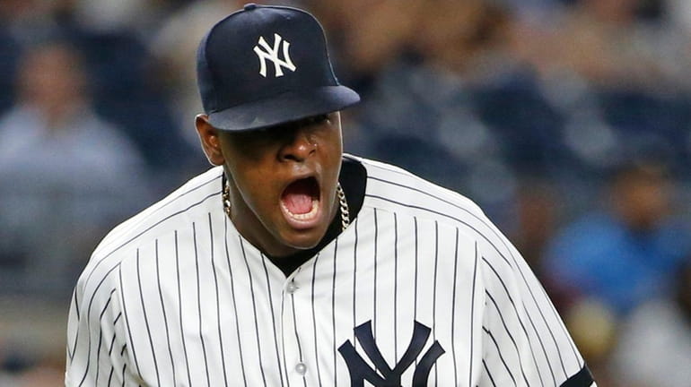 Yankees starting pitcher Luis Severino reacts after the Rays' Corey...