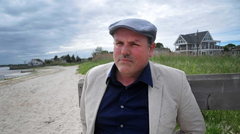 Author Matthew McGevna on a South Shore beach. His novel,...