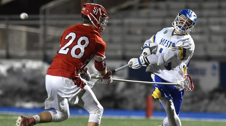 Ryan Tierney of Hofstra scores on a shot during an...
