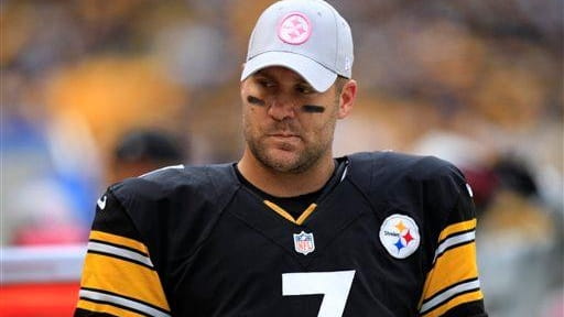Pittsburgh Steelers quarterback Ben Roethlisberger stands on the sidelines during...