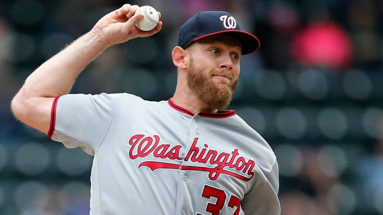 Stephen Strasburg of the Washington Nationals pitches during the first...