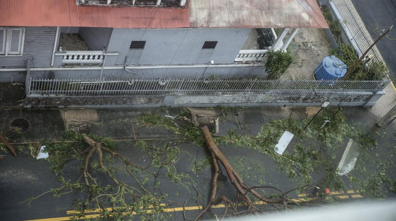 Damage in the Miramar neighborhood in San Juan, Puerto Rico,...