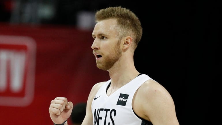 The Nets' Dzanan Musa reacts after a play against the...