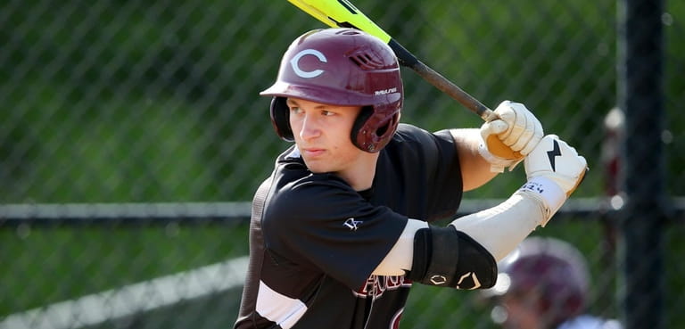 Clarke's Tyler Cox bats during the first inning against Oyster...