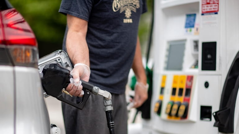 Consumers cut back on driving as gas prices hit $5,...