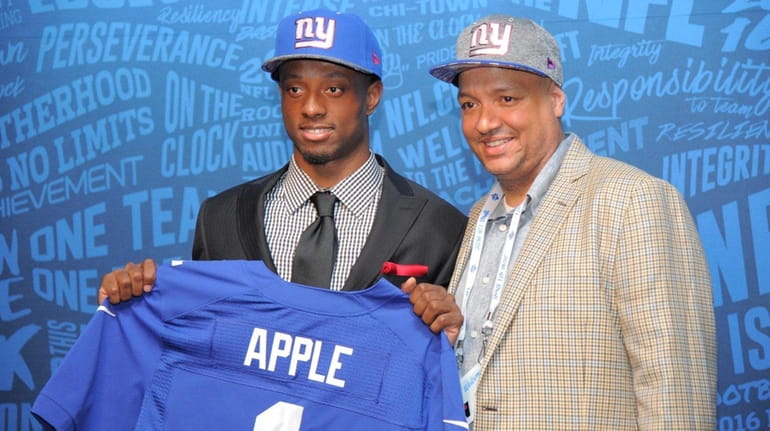 Giants first-round pick Eli Apple with his stepdad Tim Apple...