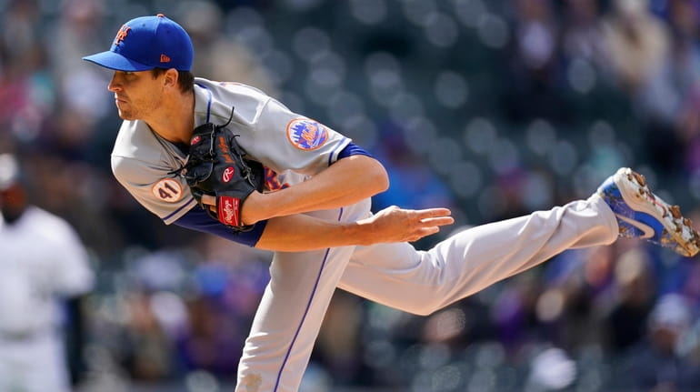 Mets starting pitcher Jacob deGrom works against the Colorado Rockies...