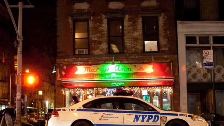A police car in the East Village on a Saturday...