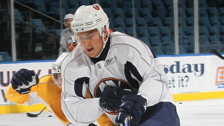 Islanders 2008 third-round pick Kirill Petrov moves around 2006 third-round...