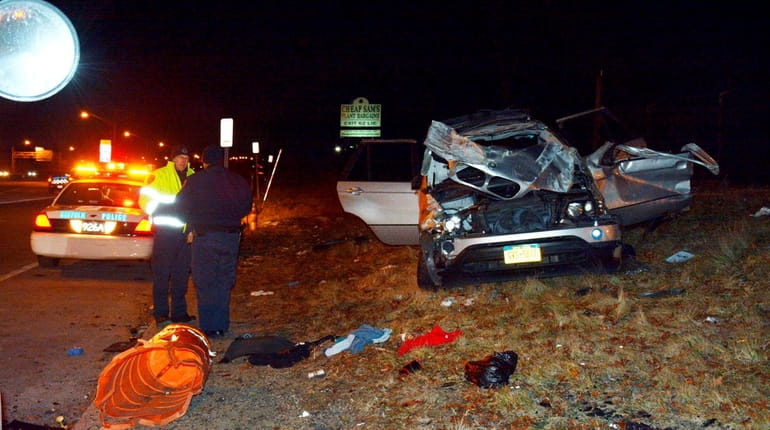 Suffolk County police investigate a crash on the westbound service...
