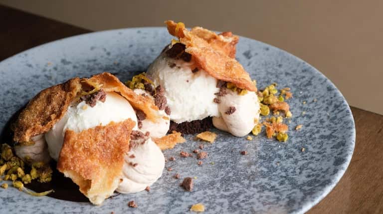 "Oops I Dropped the Cannoli" is a playful dessert of...