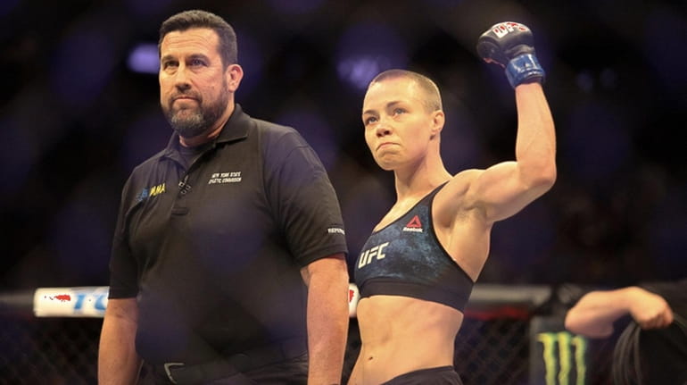 Rose Namajunas celebrates her first-round knockout for the upset win...