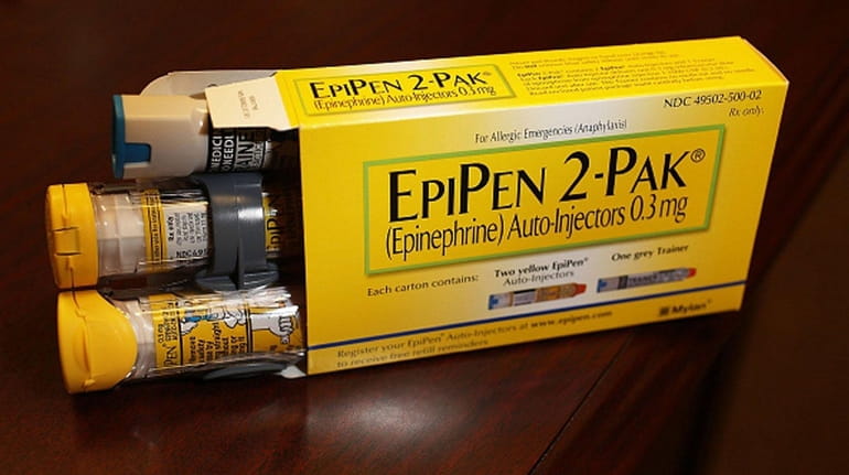 EpiPen, which dispenses epinephrine through an injection mechanism for people...