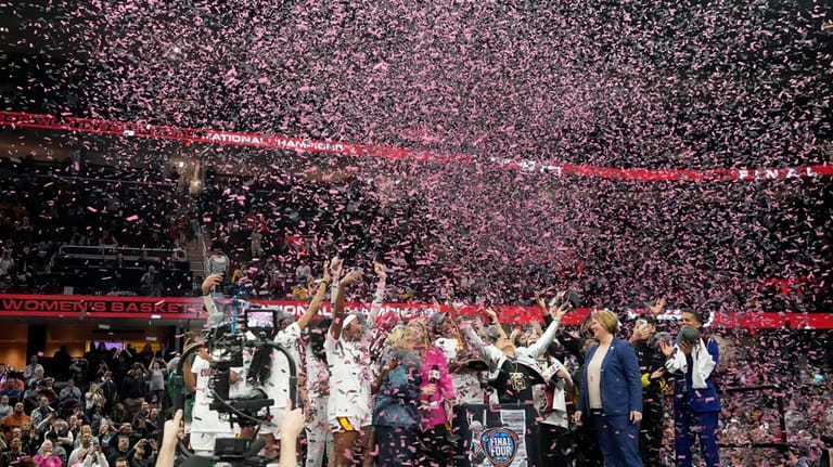 South Carolina players and coach celebrate after the Final Four...