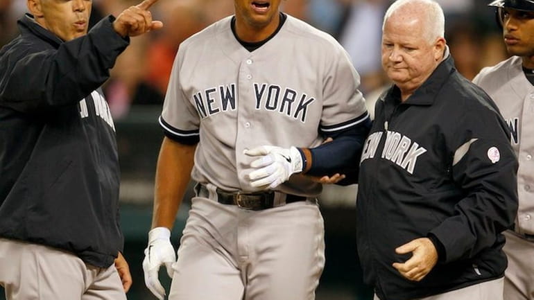 New York Yankees'manager Joe Girardi, left, points as, Alex Rodriguez,...