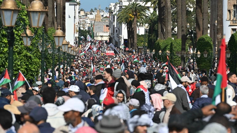 Moroccans take part in a protest in support of Palestinians...