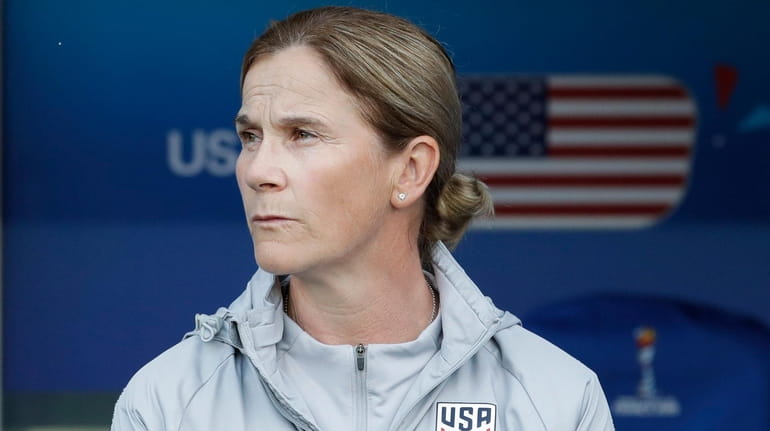 United States coach Jill Ellis stands by the bench prior...