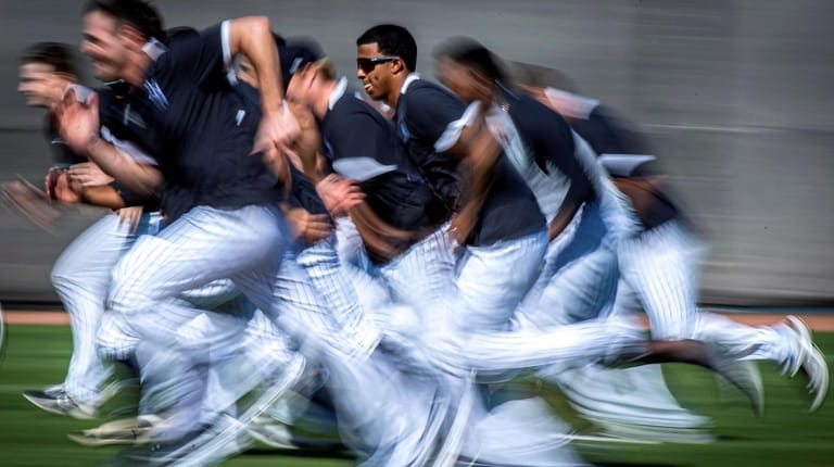 New York Yankees pitchers running intervals during spring training in...