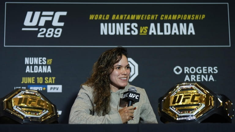Amanda Nunes responds to questions during a news conference ahead...