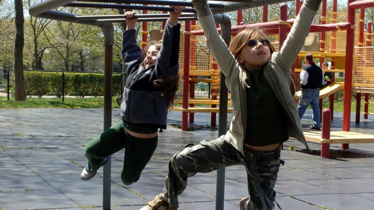 Kids at play in Eisenhower Park in East Meadow.
