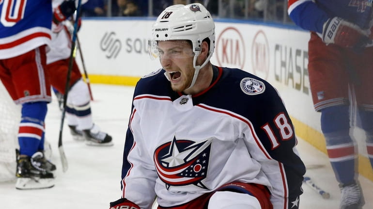 Pierre-Luc Dubois  of the Blue Jackets celebrates his overtime goal...