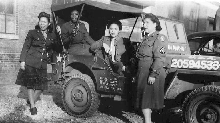 Members of the 6888th Central Postal Directory Battalion, an all-female,...