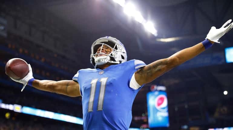 Lions wide receiver Marvin Jones looks towards the stands after...