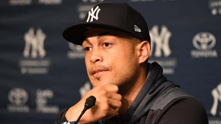 Yankees leftfielder Giancarlo Stanton looks on during a press conference...