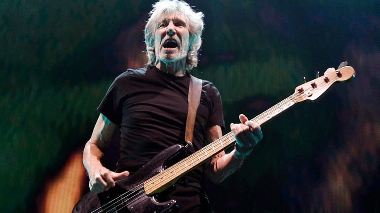 Roger Waters performs during his "Us + Them" tour stop...