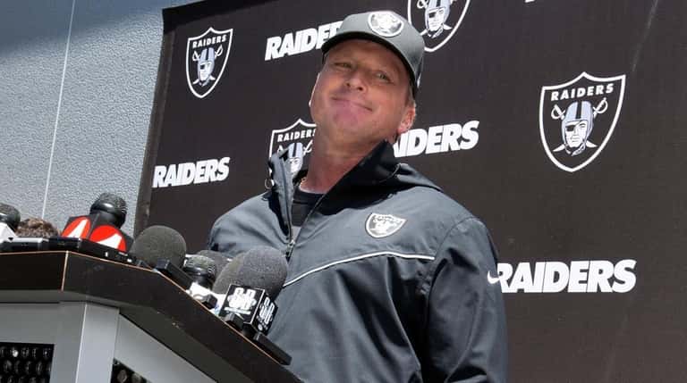 Raiders head coach Jon Gruden answers questions at a press...