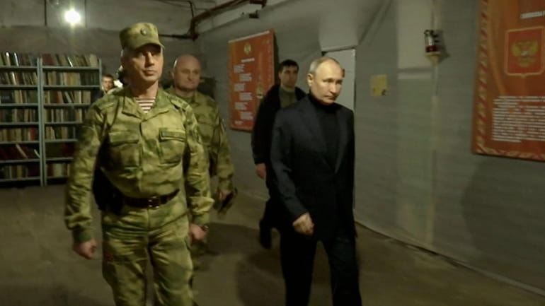 Russian President Vladimir Putin visits the headquarters of the Vostok National...
