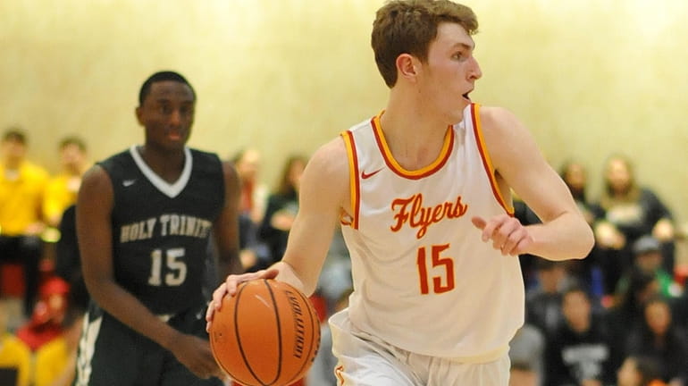 Robert Connors #15 of Chaminade dribbles downcourt during a CHSAA...