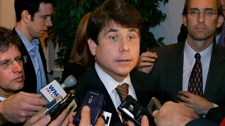 Illinois Gov. Rod Blagojevich speaks with news reporters Tuesday, Oct....
