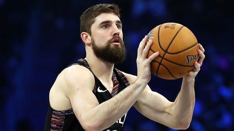 Joe Harris #12 of the Nets takes a shot during...