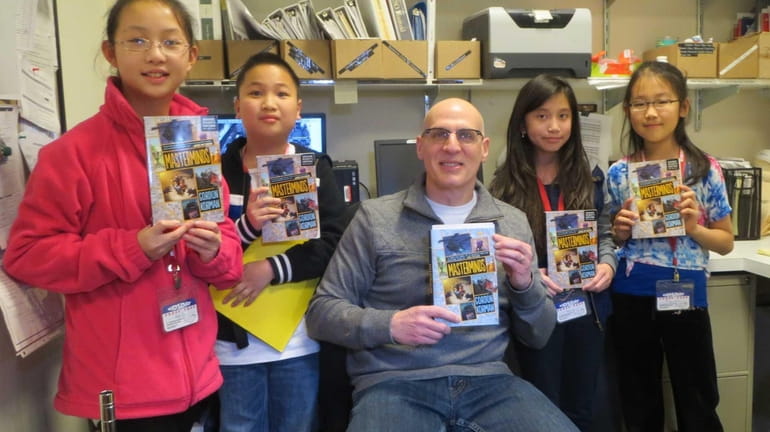 Author Gordon Korman with Kidsday reporters Amy He, Oscar Fang,...