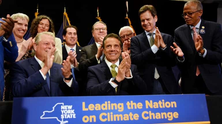 Gov. Andrew M. Cuomo is joined by former Vice President Al Gore,...