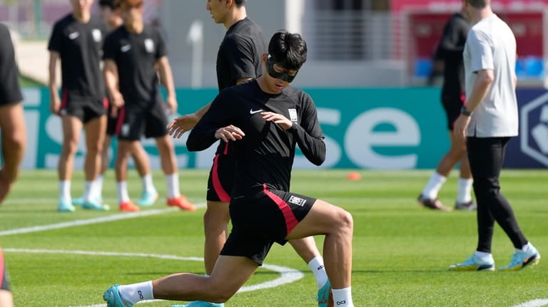 South Korea's Son Heung-min warms up during the South Korea's...