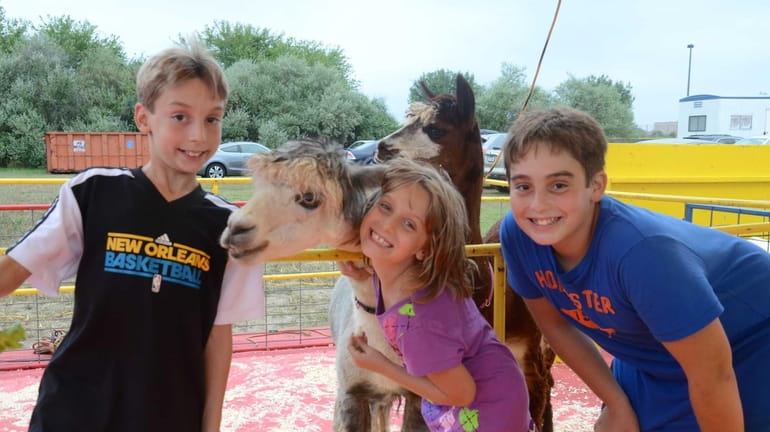 From left, the Kweit children -- Austin, 10, Farrah, 7,...