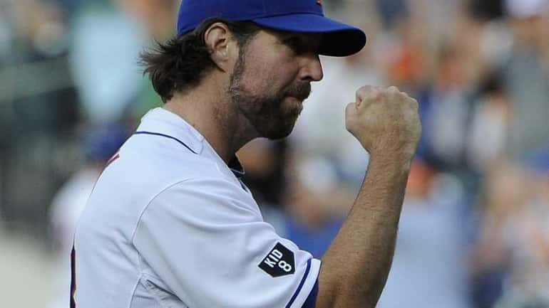 R.A. Dickey reacts after his last pitch in the ninth...