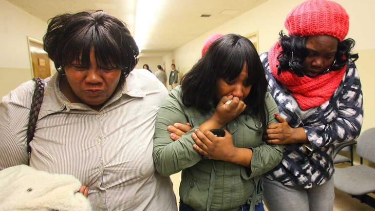Patricia Smith Blocker, left, sister of Diane McCloud and Lashawn...
