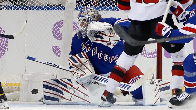 Igor Shesterkin of the Rangers surrenders a goal during the first period...
