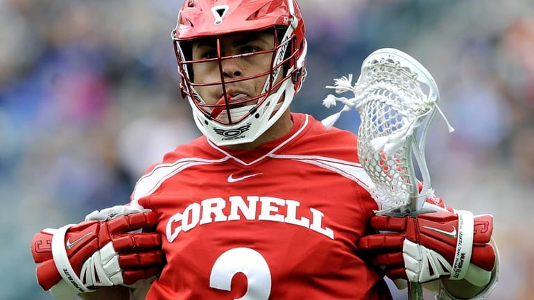 Cornell's Rob Pannell celebrates after scoring a goal in the...
