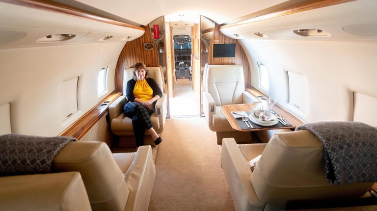 Maureen Tarascio, owner of Ventura Air Services, sits aboard a...