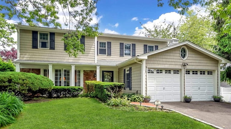 Listed for $599,000, this five-bedroom, 2½-bath Colonial at 53 Sycamore...