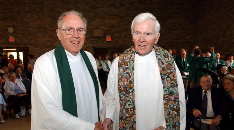 Msgr. Emmet P. Fagan (left), with his brother Msgr. John...